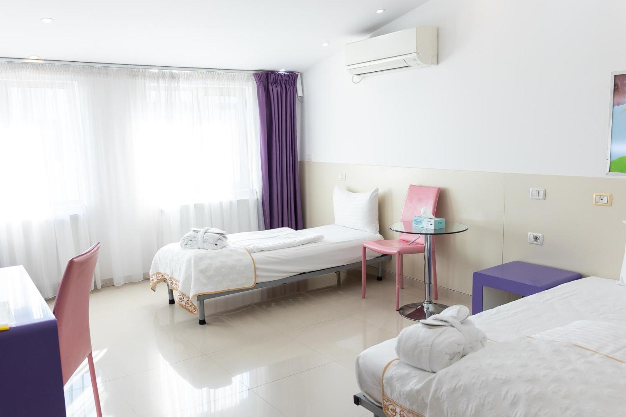 Hotel Christina Plus Hotel