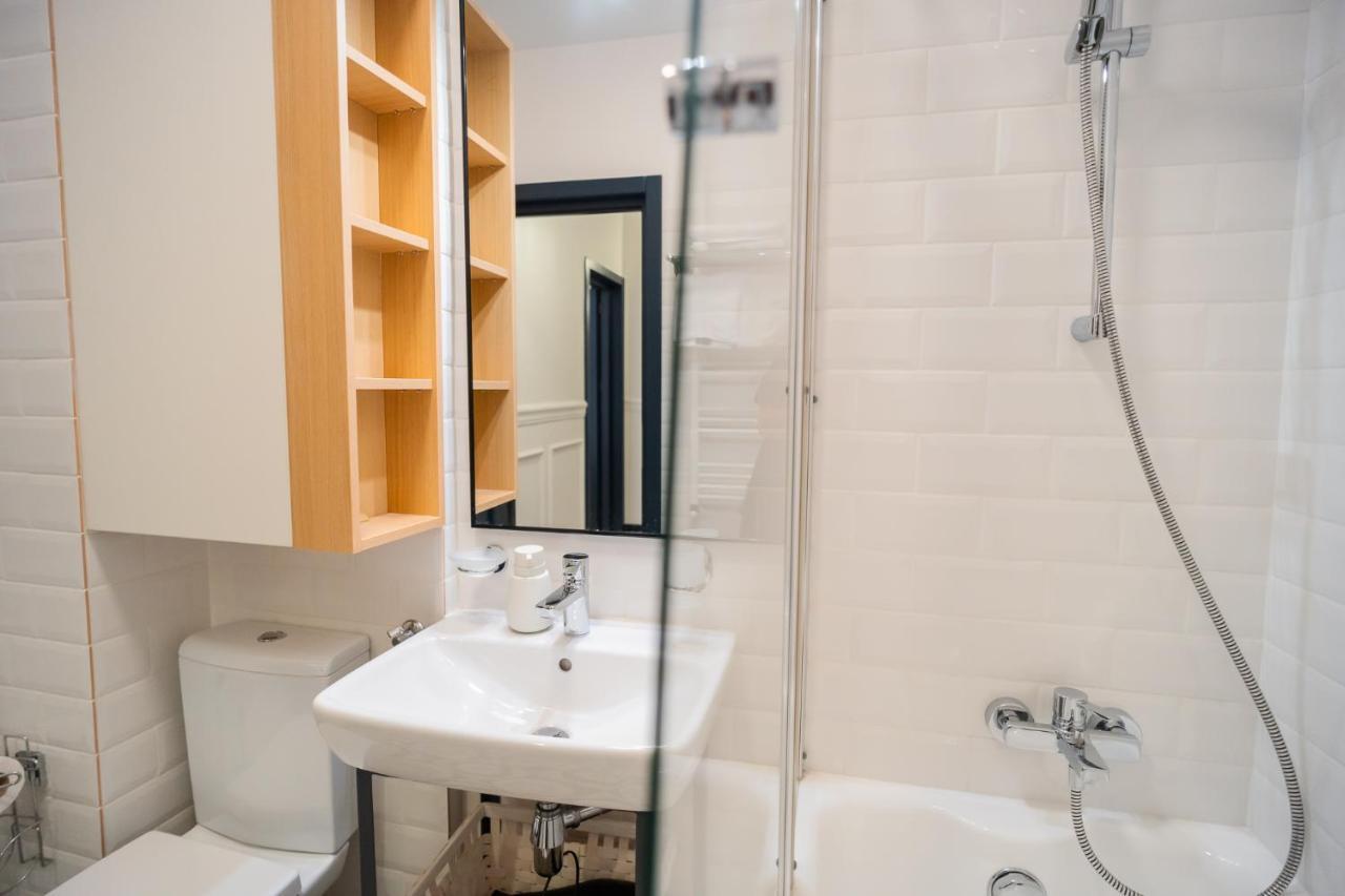 Historic Charm Meets Modern Comfort: Athenaeum 2br Apartment