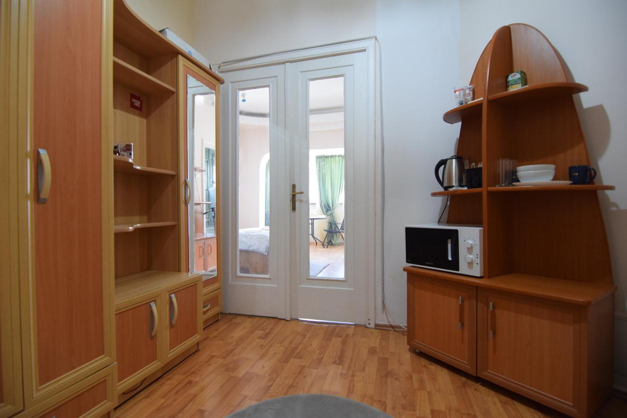 In The Center Of Apartment *