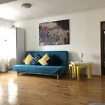 Hats By Green Apartments