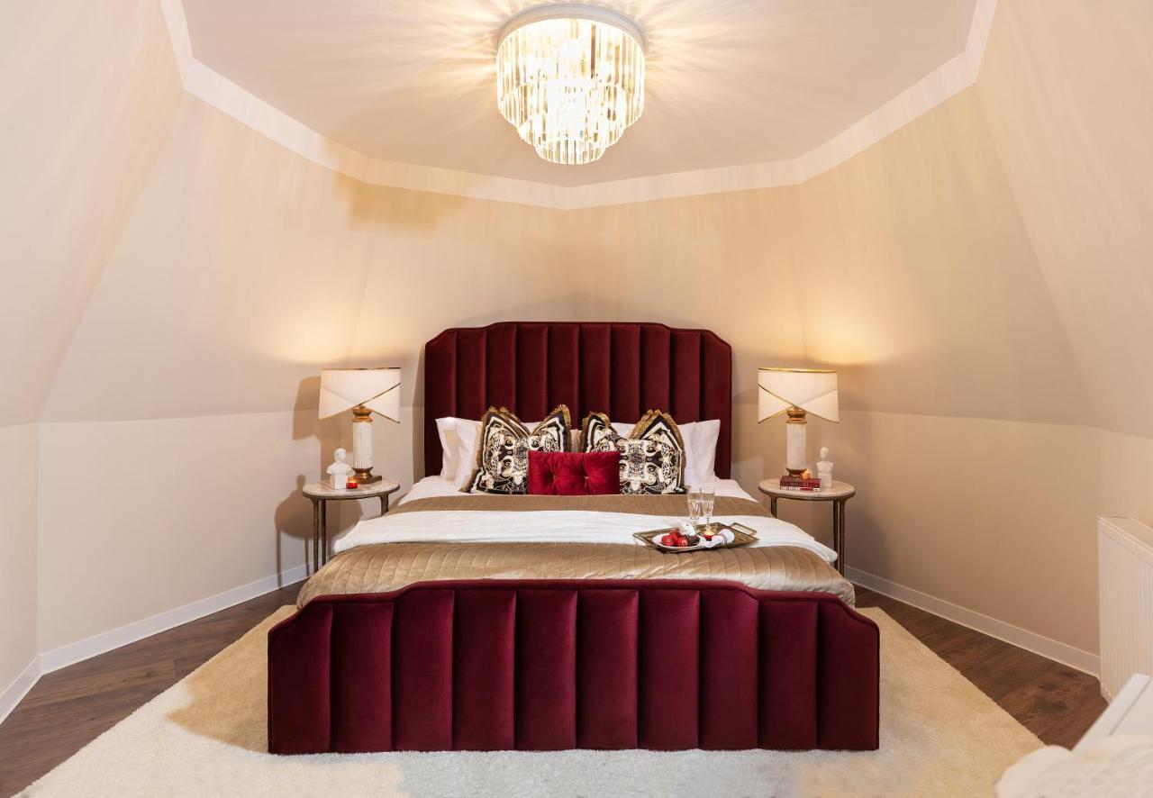 Qult - Invictus Apartament Bucureşti