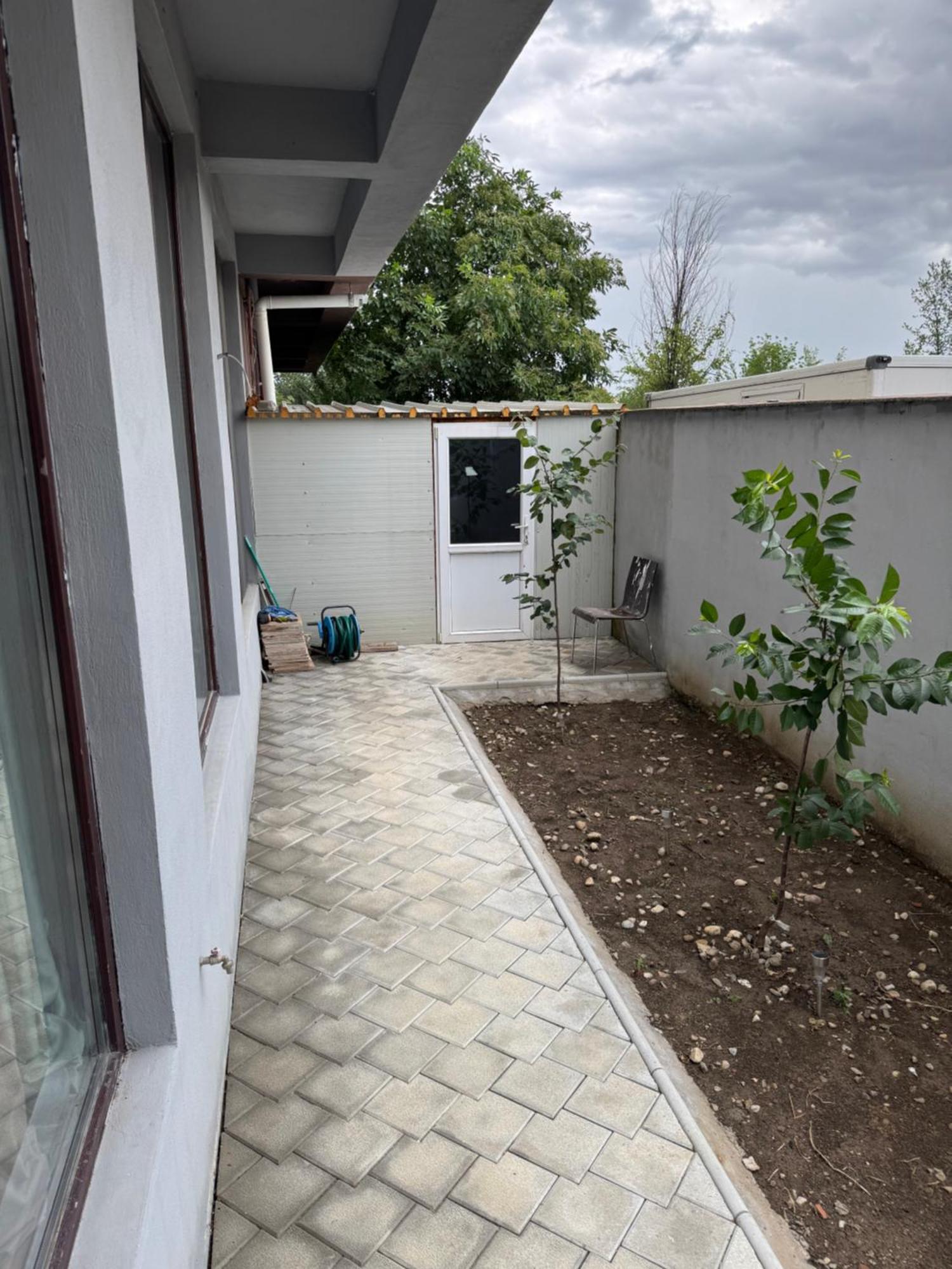 With Garden Apartment
