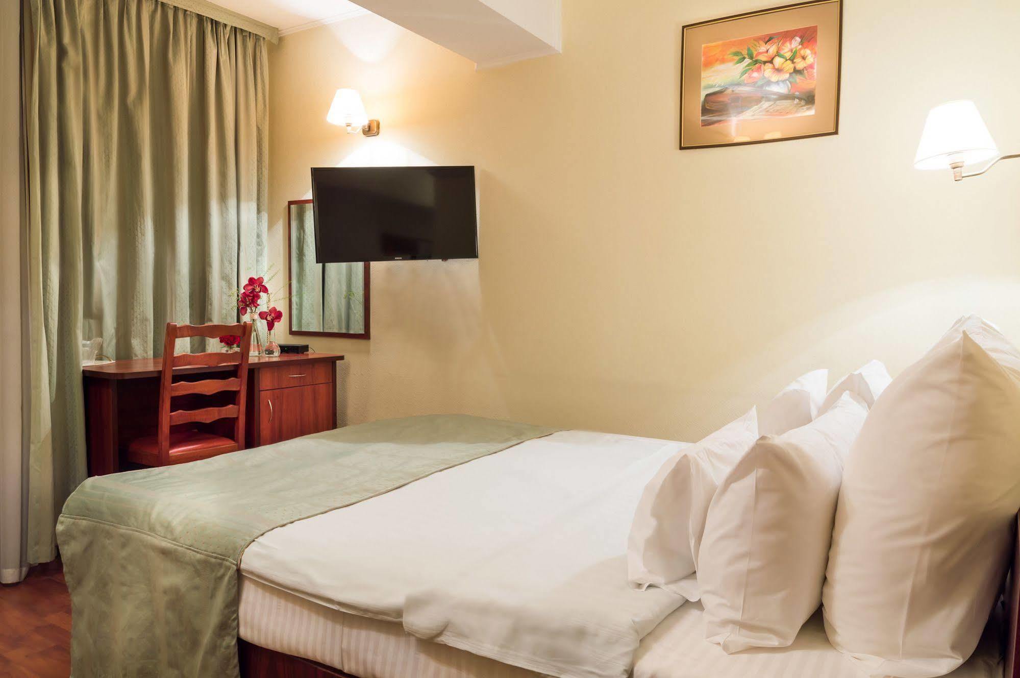 Atrium City Center Hotel 4*